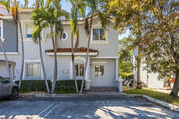 a view of a swimming pool with a lounge chairs