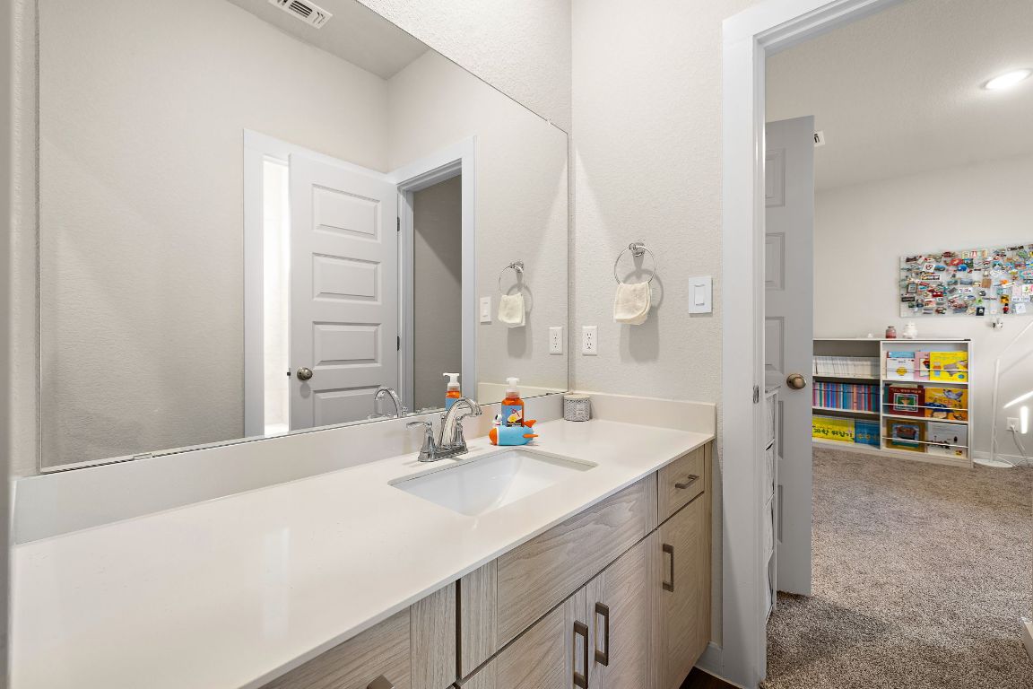 120 Upland Drive Georgetown, TX 78628 - Photo 14 of 21 Bathroom with vanity