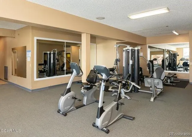a view of a room with gym equipment