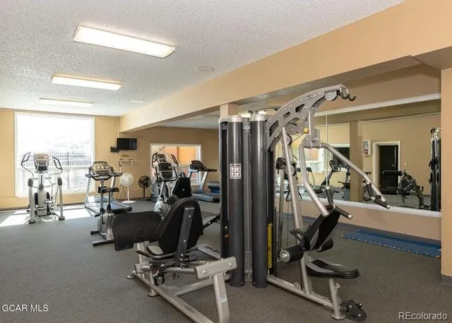 a view of a room with gym equipment