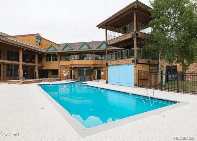 a view of a house with a swimming pool