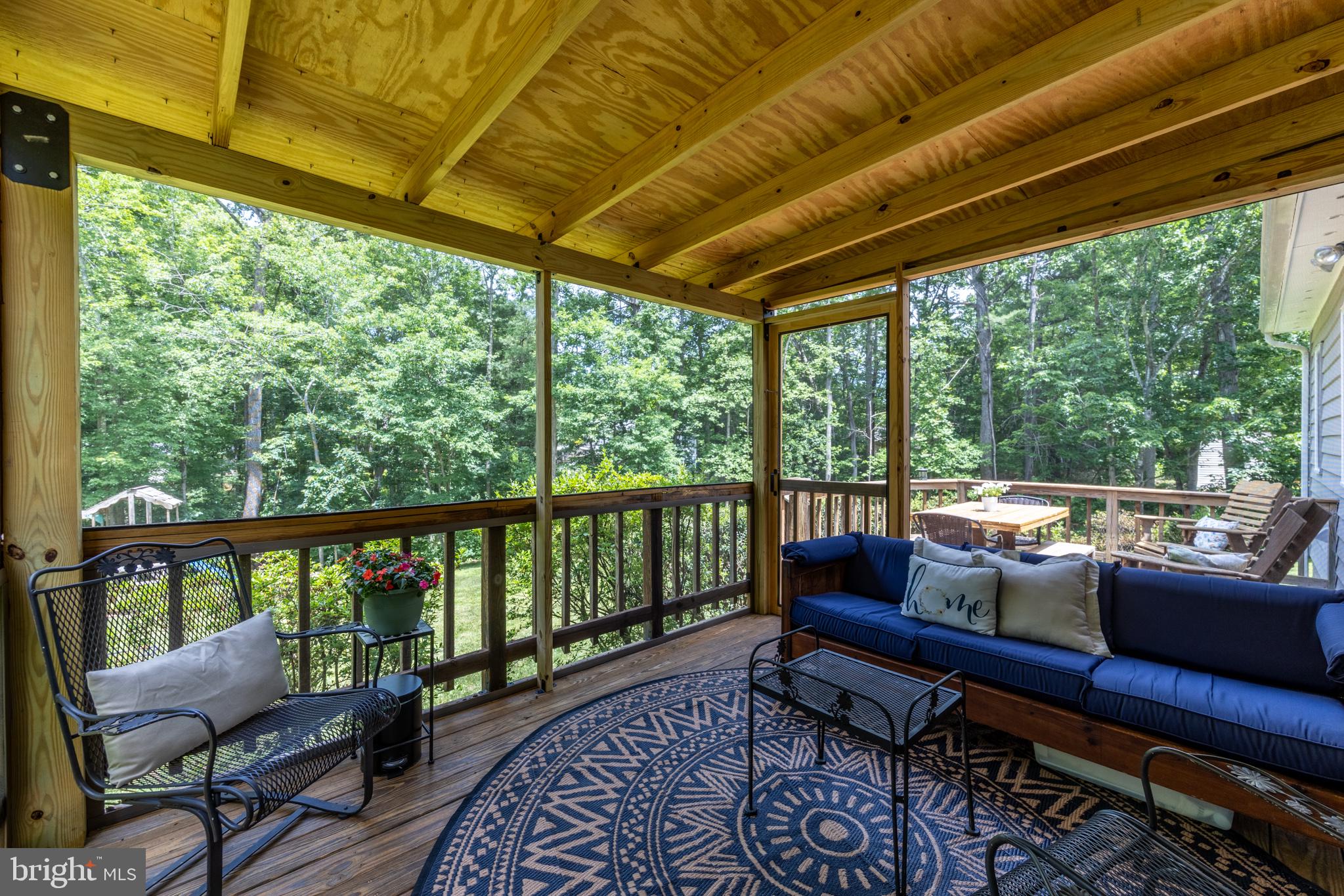 164 Oliver Lane Ruckersville, VA 22968 - Photo 6 of 39 Serene screened porch with nature views.