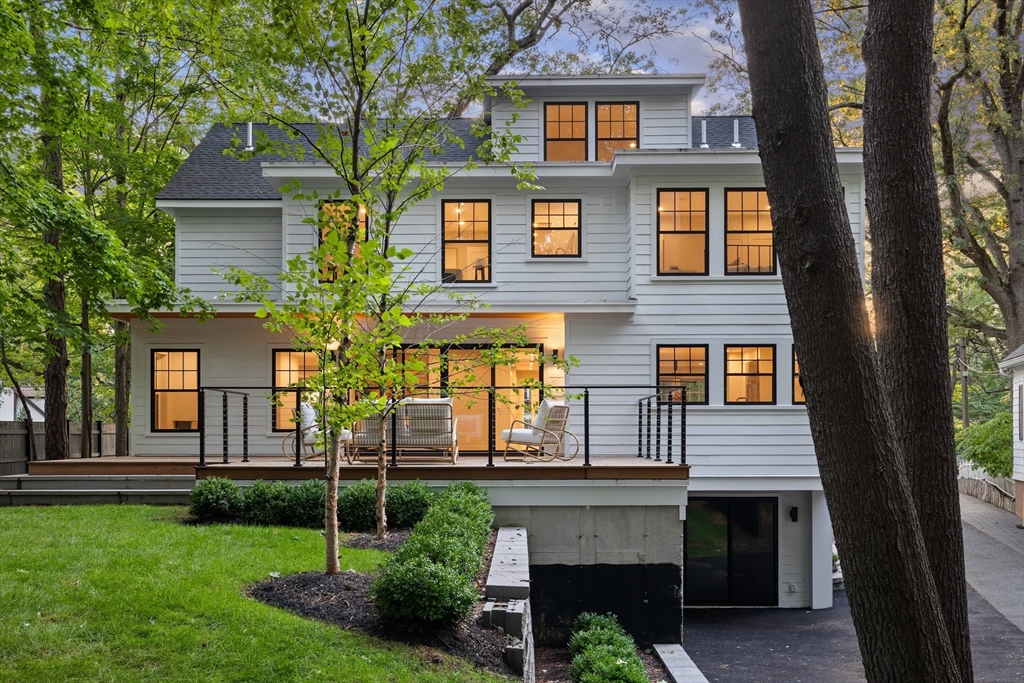 100 Varick Road Newton, MA 02468 - Photo 2 of 20 a front view of a house with garden
