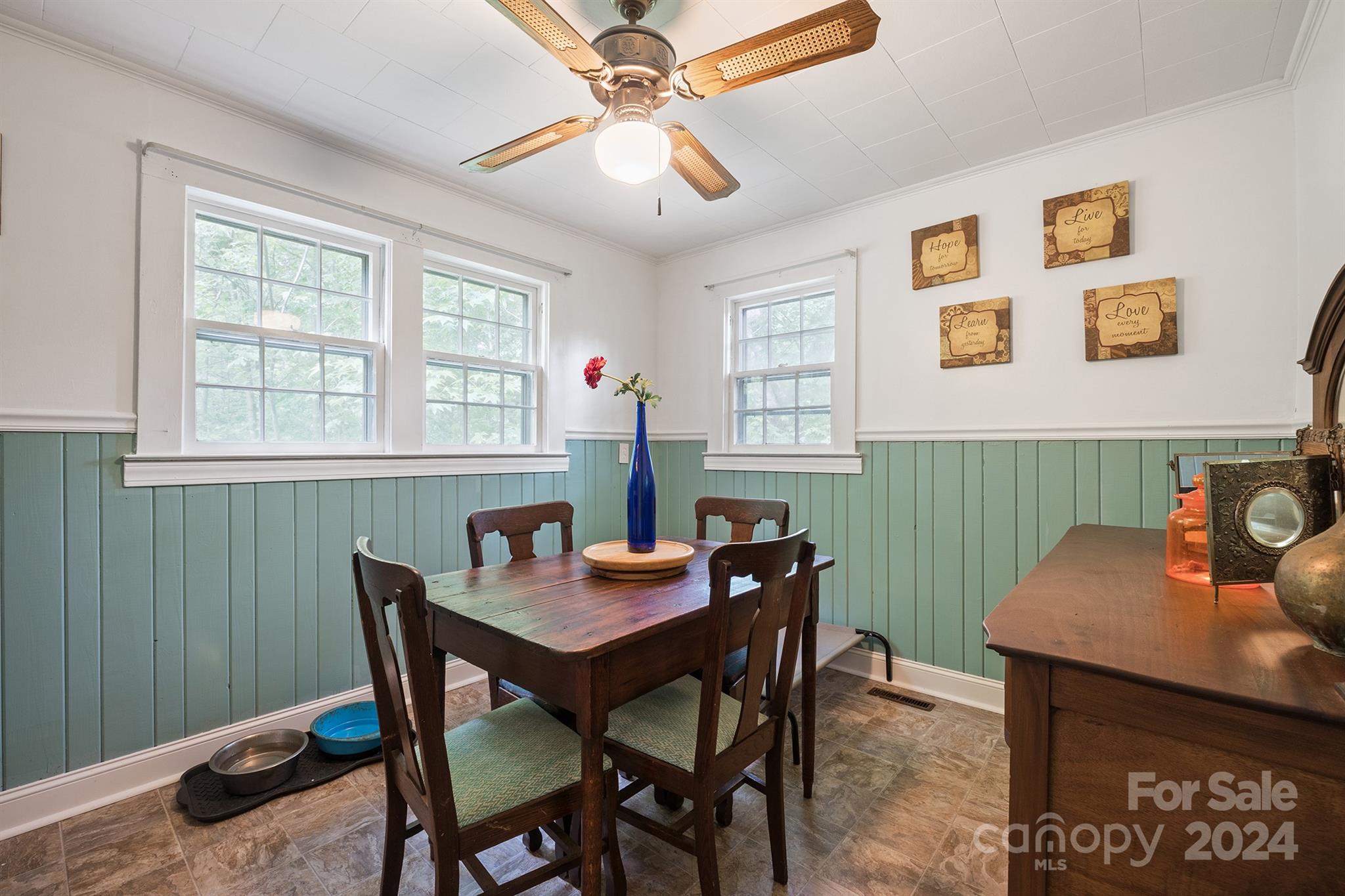 2711 Ellerwood Road Hudson, NC 28638 - Photo 11 of 19 a view of a dining room with a table and chairs