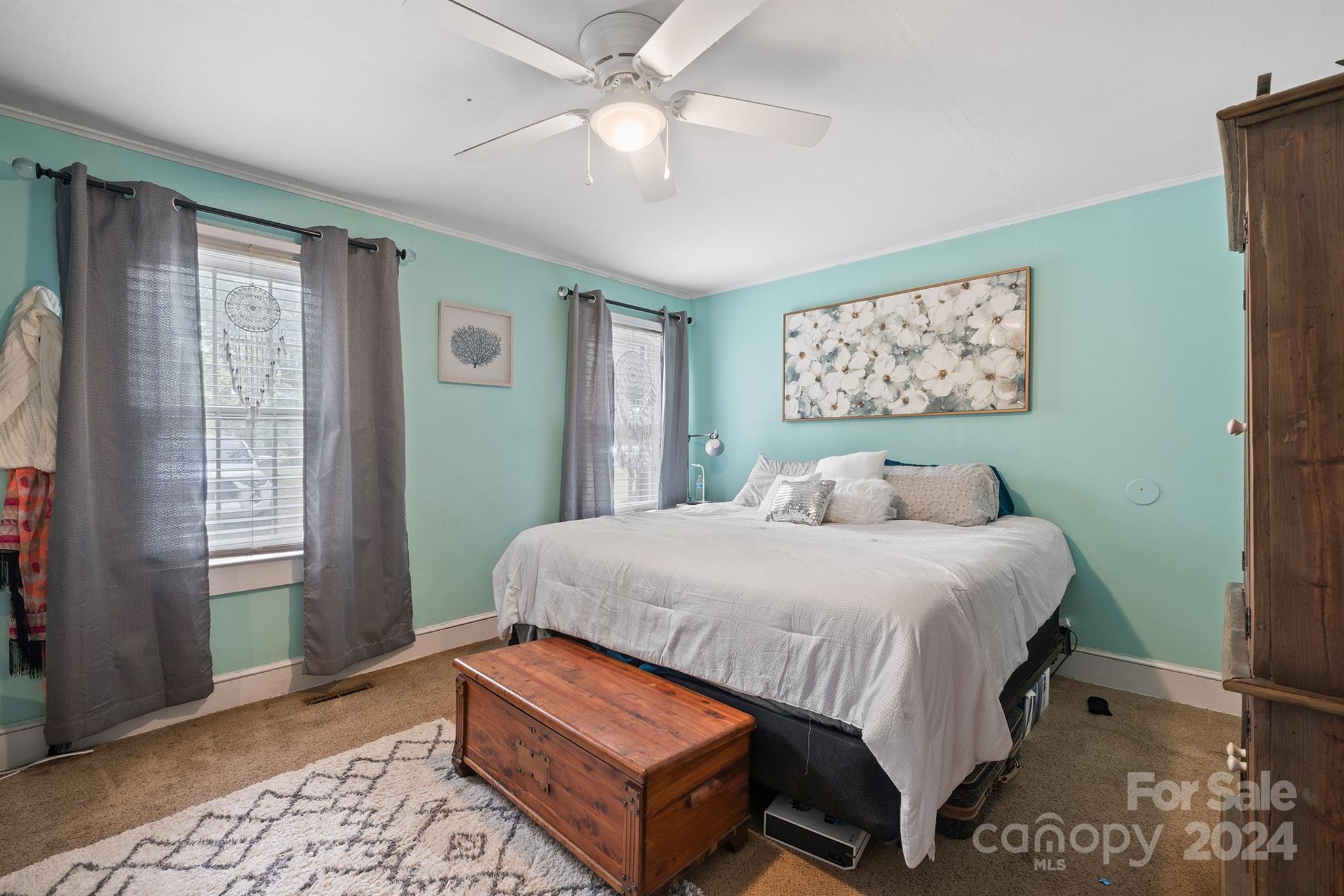 2711 Ellerwood Road Hudson, NC 28638 - Photo 16 of 19 a bedroom with a bed lamp and a window