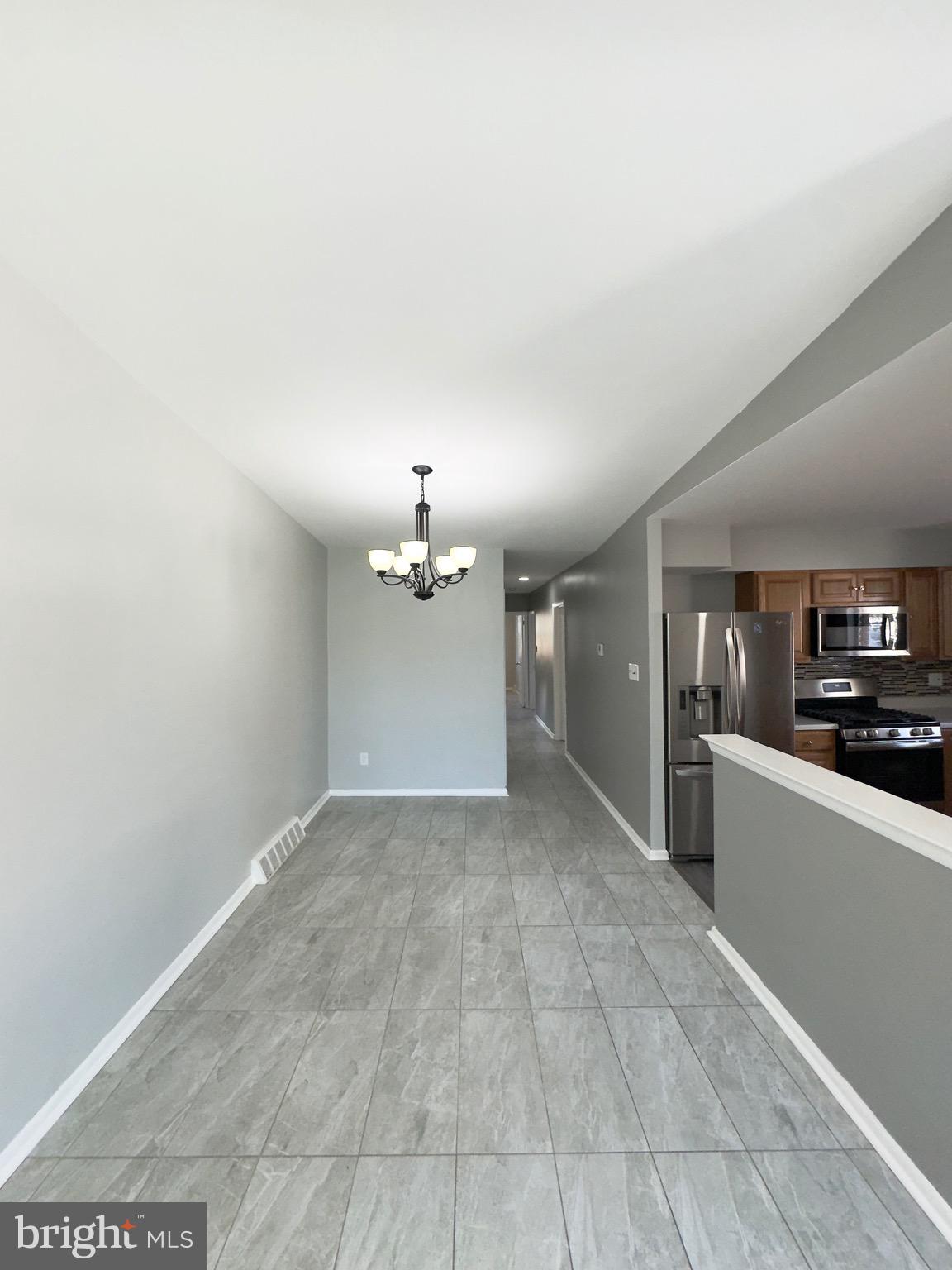 7806 Summerdale Avenue, Unit 1 Philadelphia, PA 19111 - Photo 3 of 9 a view of a car park in front of a house