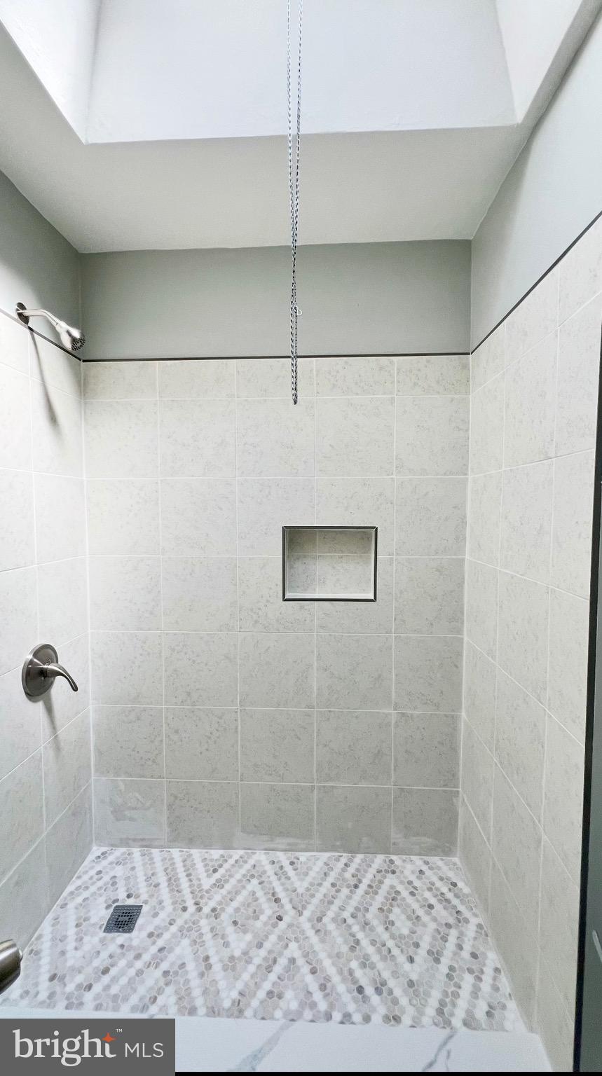 7806 Summerdale Avenue, Unit 1 Philadelphia, PA 19111 - Photo 6 of 9 a bathroom with a shower