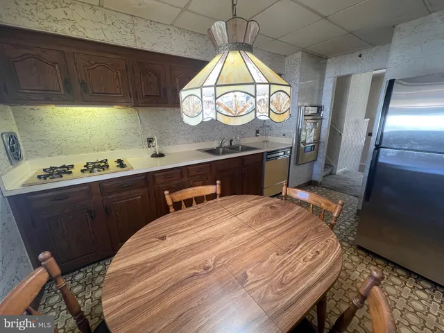 a bedroom with a bed and a mirror