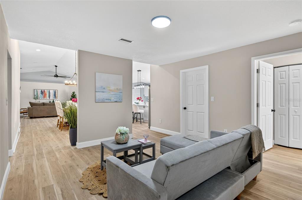 7078 South Threshold Point Homosassa, FL 34446 - Photo 15 of 75 a living room with furniture and a wooden floor