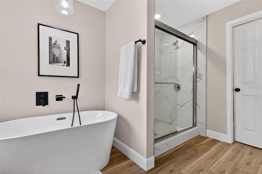 7078 South Threshold Point Homosassa, FL 34446 - Photo 29 of 75 a view of a bathroom with a tub and shower