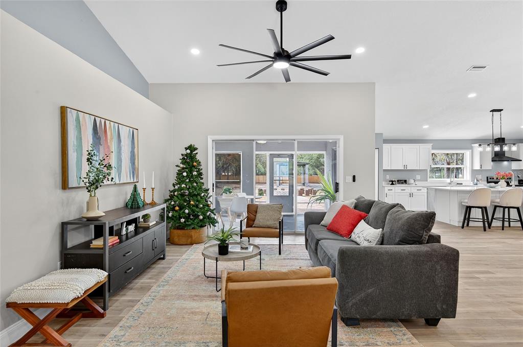 7078 South Threshold Point Homosassa, FL 34446 - Photo 35 of 75 a living room with furniture and a large window