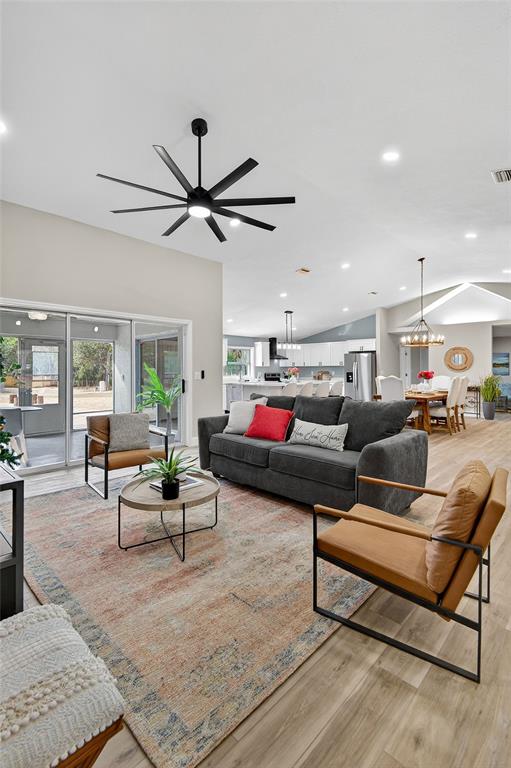 7078 South Threshold Point Homosassa, FL 34446 - Photo 49 of 75 a living room with furniture and a ceiling fan