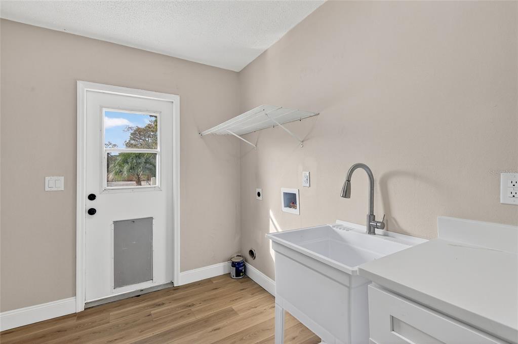7078 South Threshold Point Homosassa, FL 34446 - Photo 56 of 75 a bathroom with a sink and mirror