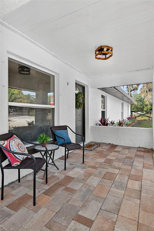 7078 South Threshold Point Homosassa, FL 34446 - Photo 57 of 75 a view of a livingroom with furniture and a window