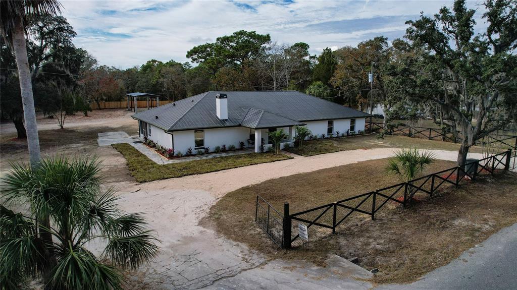 7078 South Threshold Point Homosassa, FL 34446 - Photo 71 of 75 a view of a house with backyard and sitting area