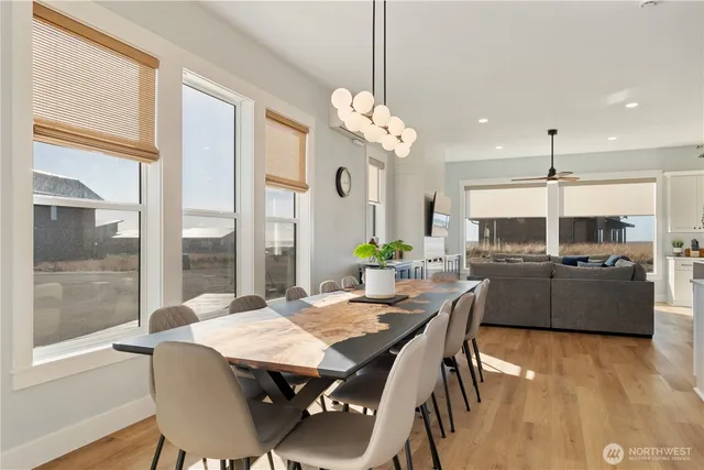a kitchen with a sink stainless steel appliances and refrigerator