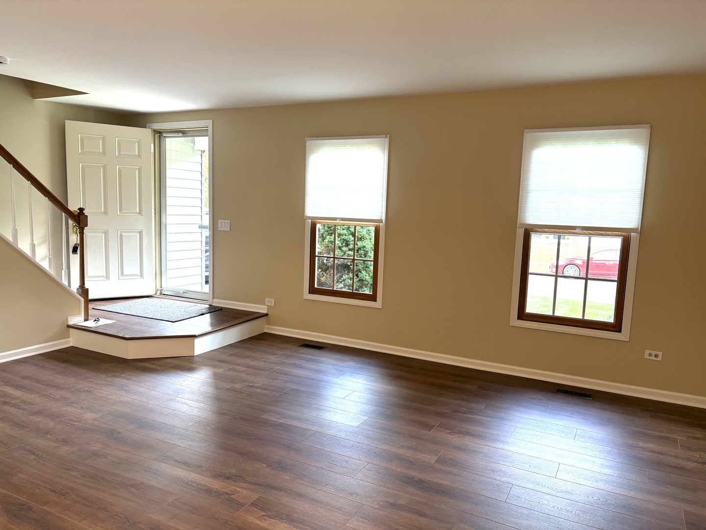 2024 Westfield Drive Gurnee, IL 60031 - Photo 4 of 9 an empty room with wooden floor and windows