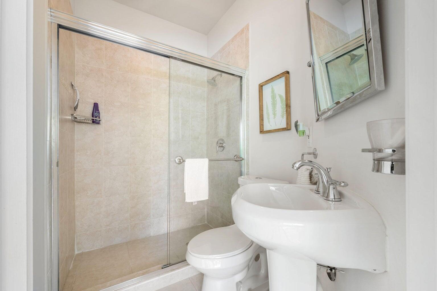 10982 Ravel Court Boca Raton, FL 33498 - Photo 17 of 43 a bathroom with a sink toilet and shower