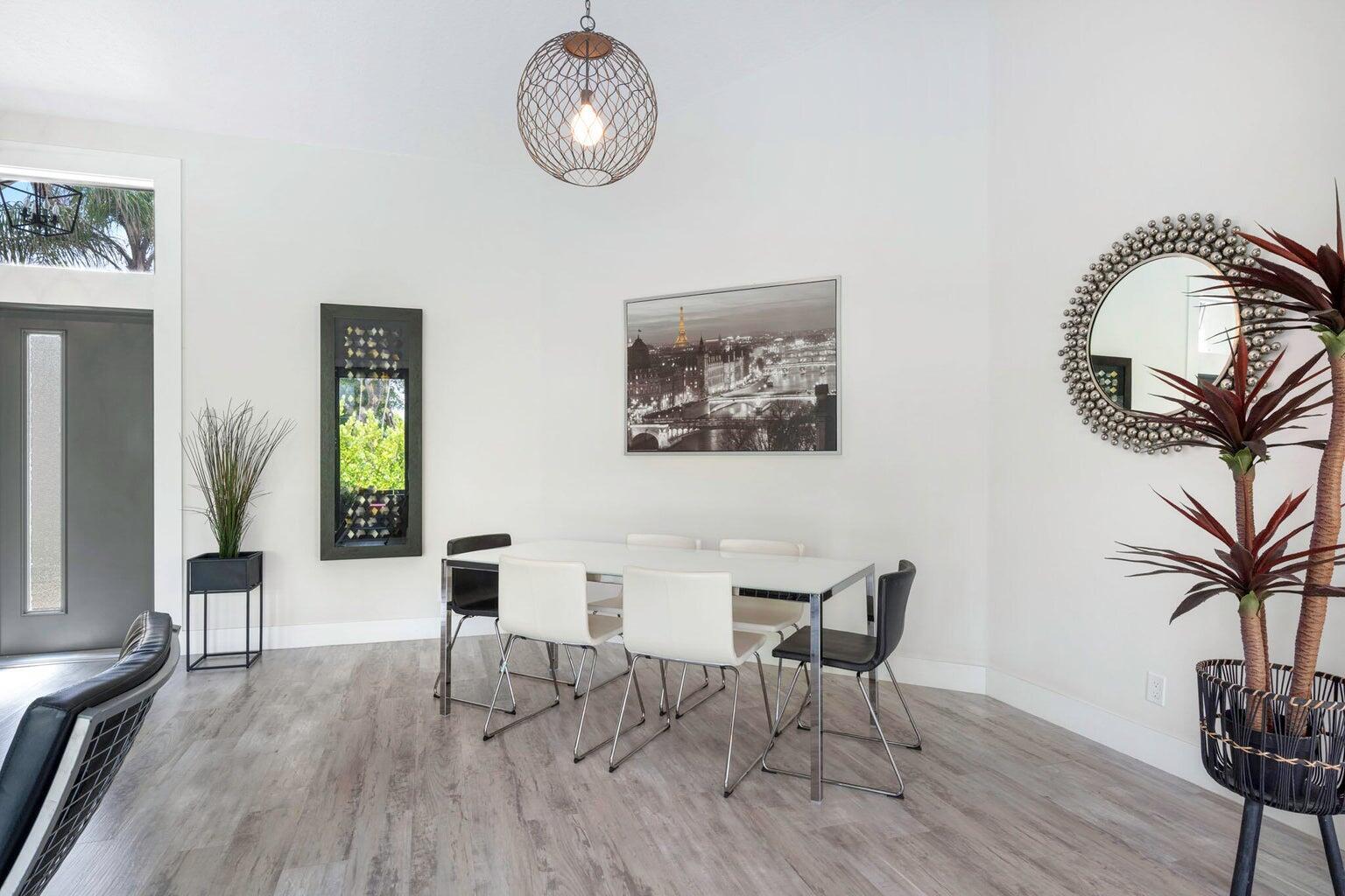 10982 Ravel Court Boca Raton, FL 33498 - Photo 6 of 43 a view of a livingroom with furniture and wooden floor