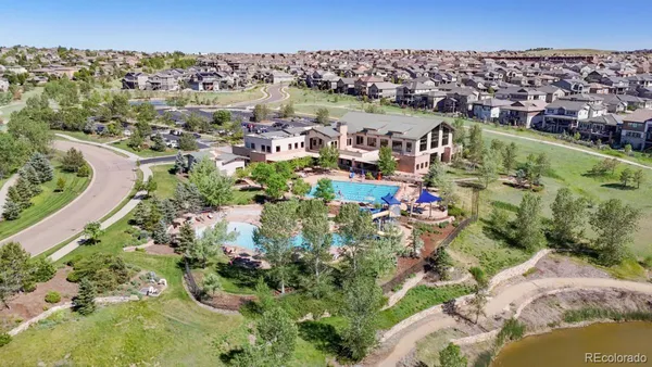 an aerial view of a house with a garden