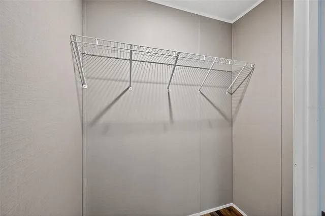 a view of a room with racks on the wall