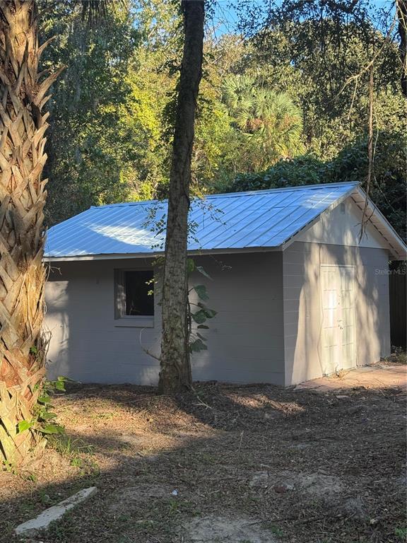 134 Weerts Road San Mateo, FL 32187 - Photo 31 of 32 a view of a house with a yard