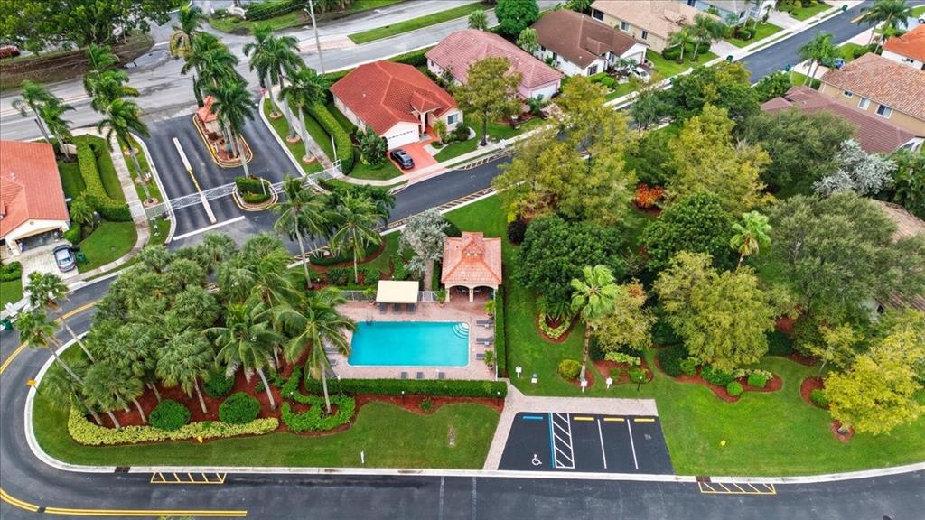 7631 Northwest 87th Terrace Tamarac, FL 33321 - Photo 5 of 23 an aerial view of a house