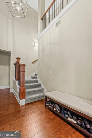a view of entryway with wooden floor