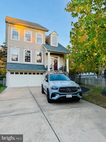a car parked in front of a house