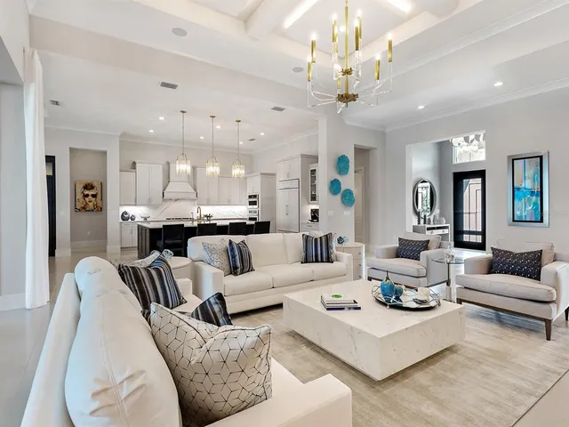 a bathroom with a granite countertop sink a mirror and a toilet
