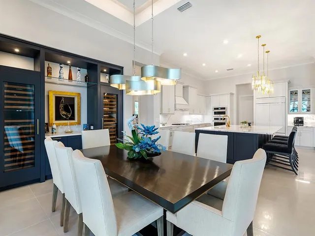 a very nice looking living room with furniture and a large window