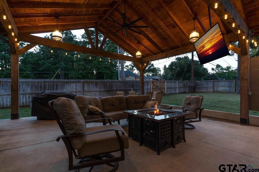 2001 Winding Run Lane Longview, TX 75605 - Photo 14 of 45 a view of a chairs in patio with a small yard