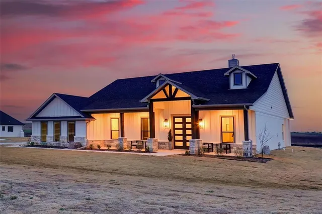 a front view of a house with a porch
