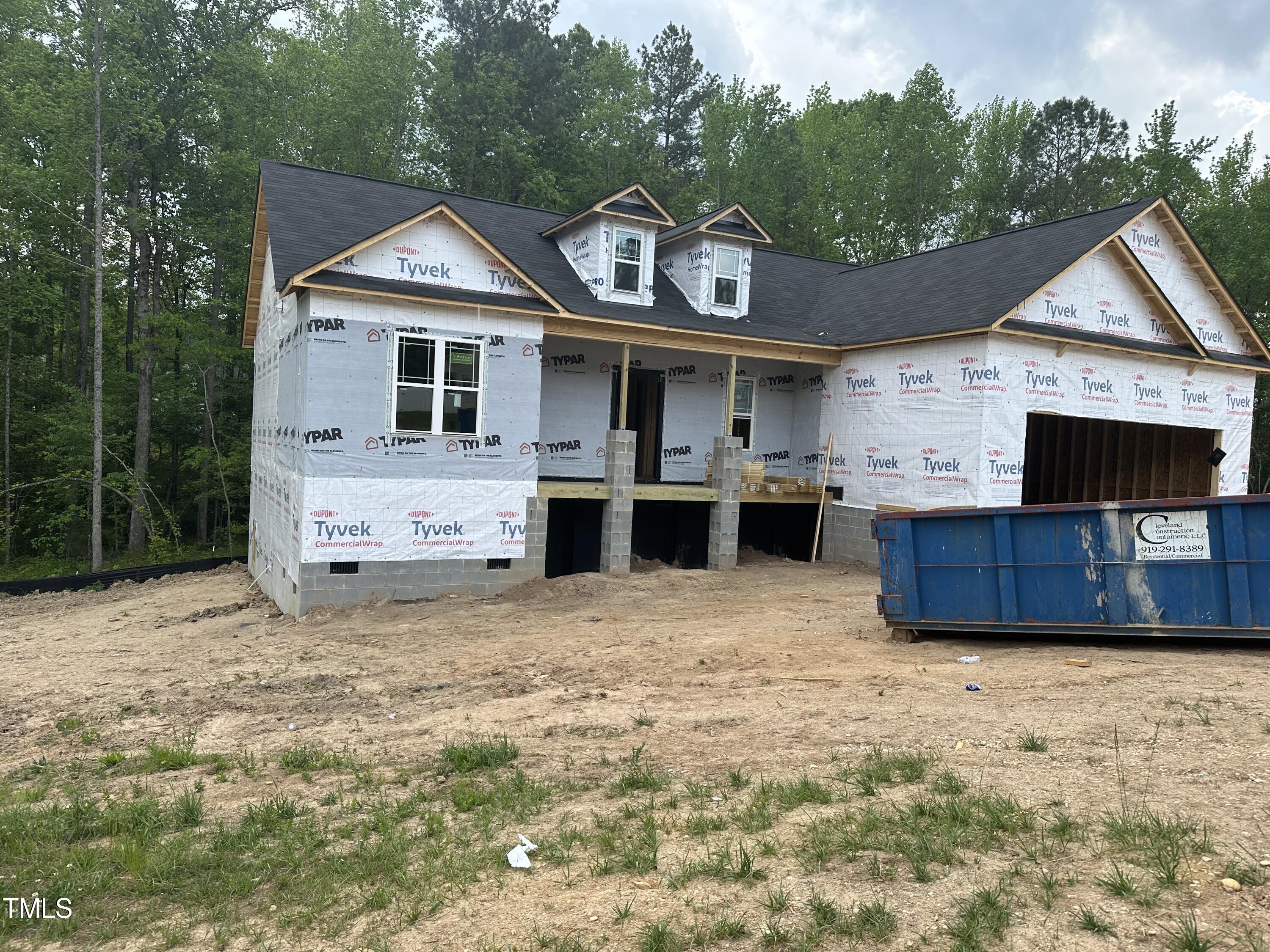 166 Split Rock Way Zebulon, NC 27597 - Photo 2 of 7 a view of a house with a yard and sitting area