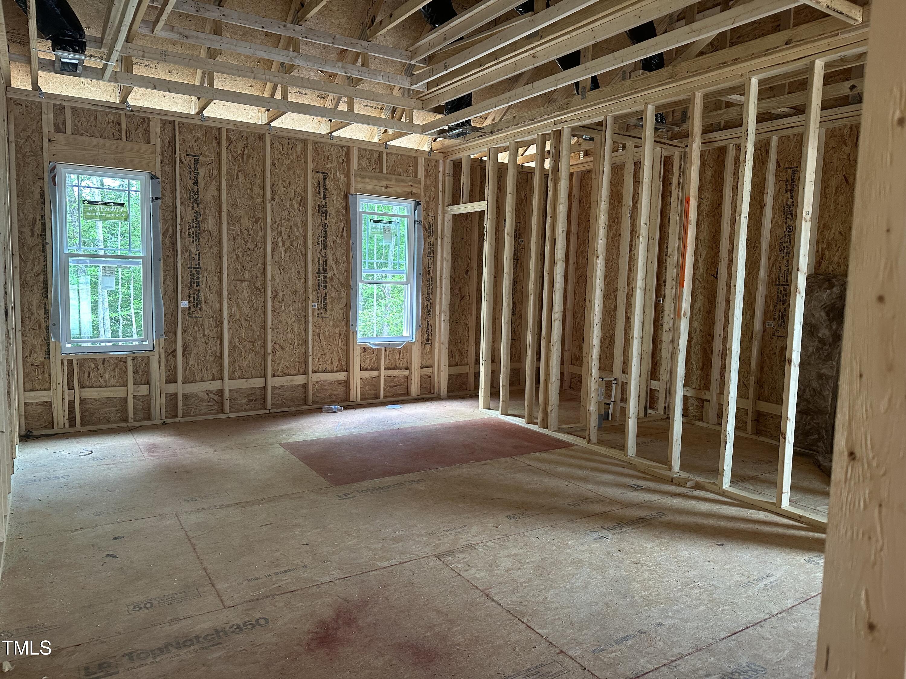 166 Split Rock Way Zebulon, NC 27597 - Photo 5 of 7 a view of outdoor space with wooden walls
