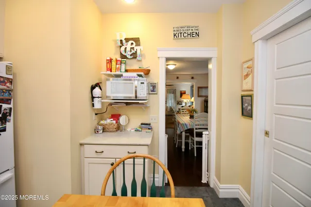 a room with table and chairs
