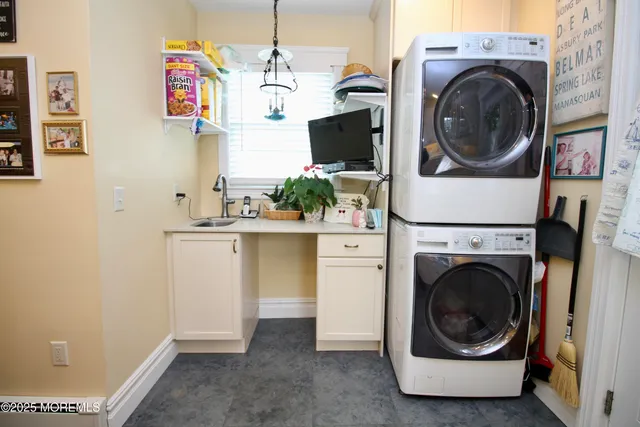 a white toilet sitting next to a bathroom sink