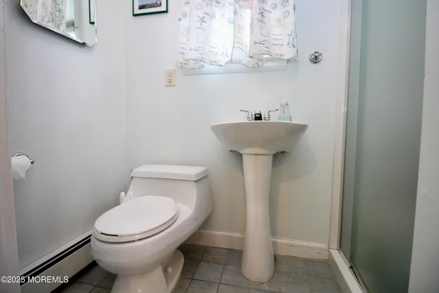 a view of a hallway with washer and dryer