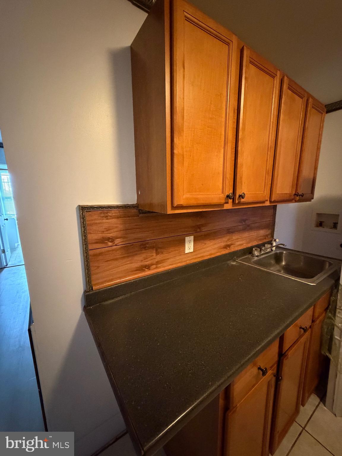 1841 West Lexington Street, Unit 3 Baltimore, MD 21223 - Photo 14 of 14 a view of washer and dryer