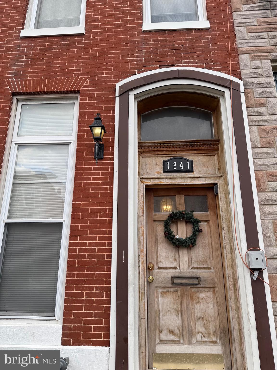 1841 West Lexington Street, Unit 3 Baltimore, MD 21223 - Photo 2 of 14 a stove top oven sitting inside of a kitchen