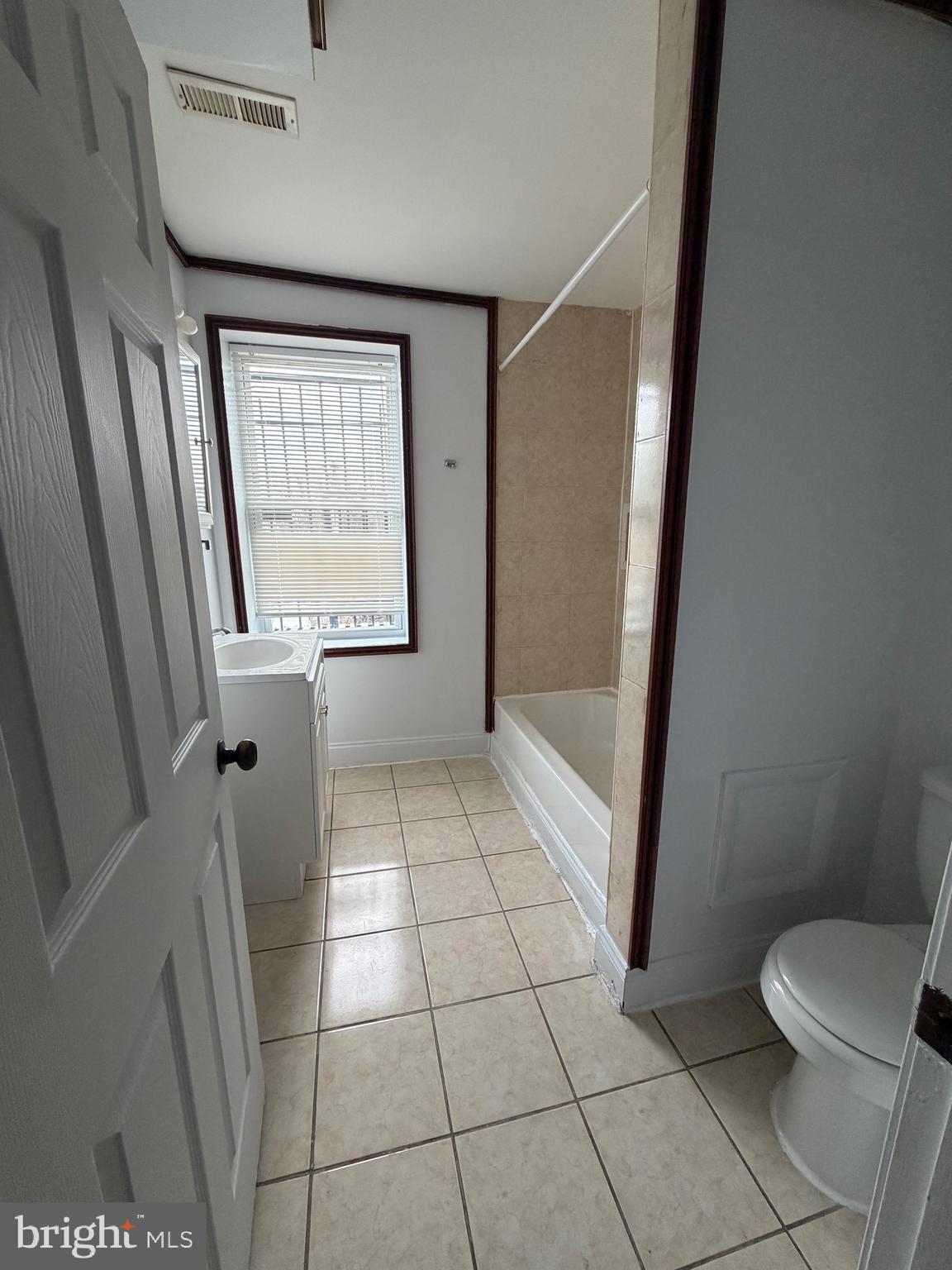 1841 West Lexington Street, Unit 3 Baltimore, MD 21223 - Photo 7 of 14 a bathroom with a toilet