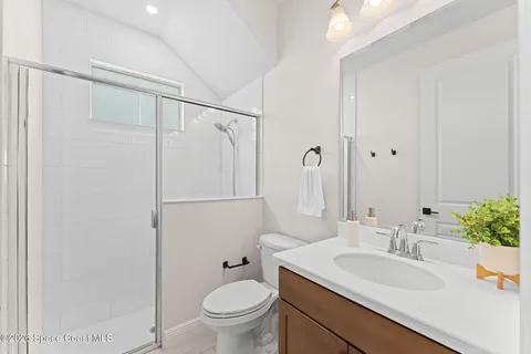 a view of a swimming pool with a yard