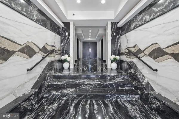 a large room with lots of potted plants