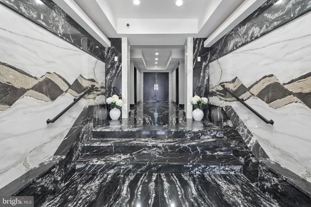 a large room with lots of potted plants