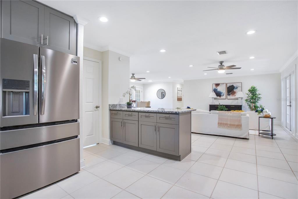 619 Marphil Loop Brandon, FL 33511 - Photo 16 of 36 a kitchen with stainless steel appliances a refrigerator sink and stove