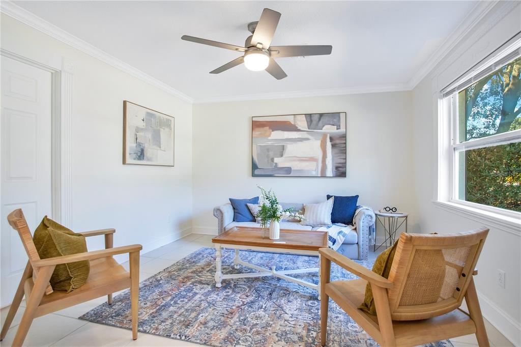 619 Marphil Loop Brandon, FL 33511 - Photo 20 of 36 a living room with furniture and a painting on the wall