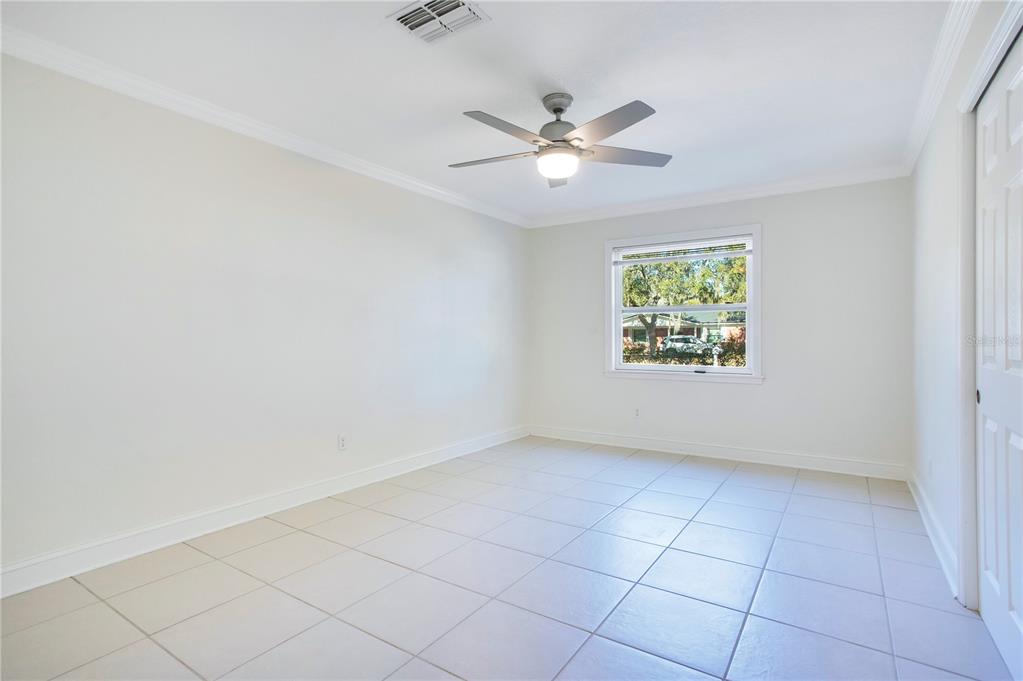 619 Marphil Loop Brandon, FL 33511 - Photo 29 of 36 an empty room with windows and fan