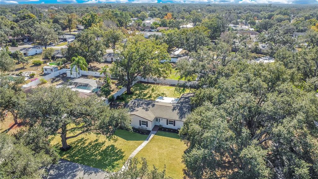 619 Marphil Loop Brandon, FL 33511 - Photo 36 of 36 an aerial view of a house with a yard and lake view