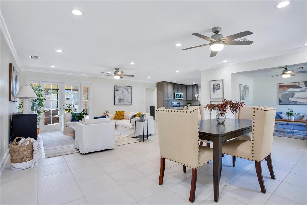 619 Marphil Loop Brandon, FL 33511 - Photo 8 of 36 a living room with furniture kitchen view and a chandelier