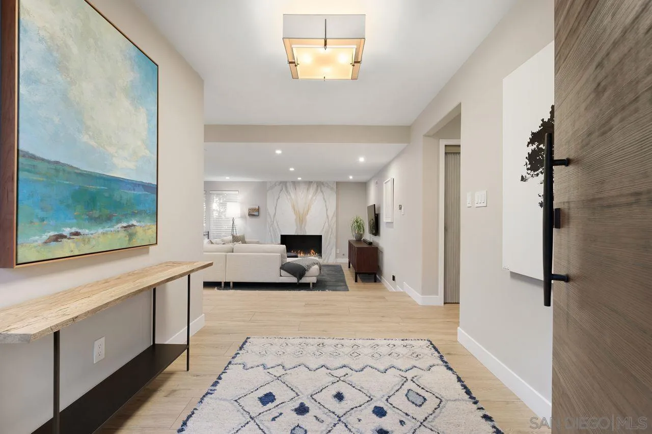 751 Hoska Drive Del Mar, CA 92014 - Photo 11 of 43 a large white kitchen with a large window